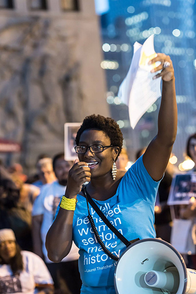 Tuesday night’s vigil began with a call and response version of Bob Marley’s “Redemption Song.” (Photo: Sarah Jane Rhee)