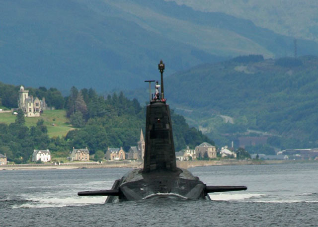 A British Trident nuclear-armed submarine leaving its base on the Clyde. 