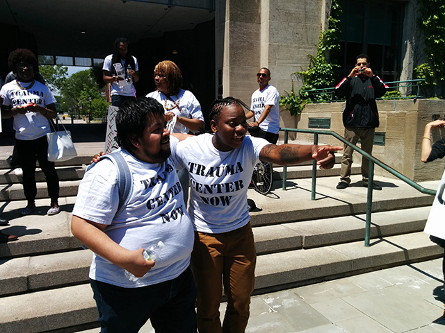 Activists from the Trauma Care Coalition disrupt the University of Chicago’s Alumni Weekend in June 2015. (Photo: Kelly Hayes)