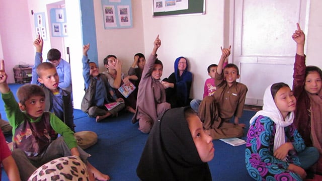 Afghan Street Kids volunteering for teams to serve a meal to 100 day laborers in Kabul. (Photo: Dr. Hakim)