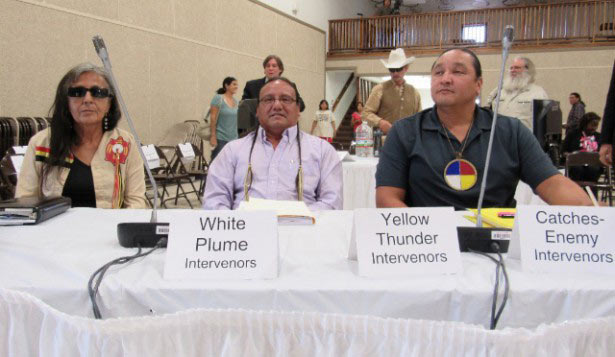 Debra White Plume (with Lakota cultural experts) prepares to testify at the Nuclear Regulatory Commissions’ hearings. (Photo: WNV / Rosy Torres)