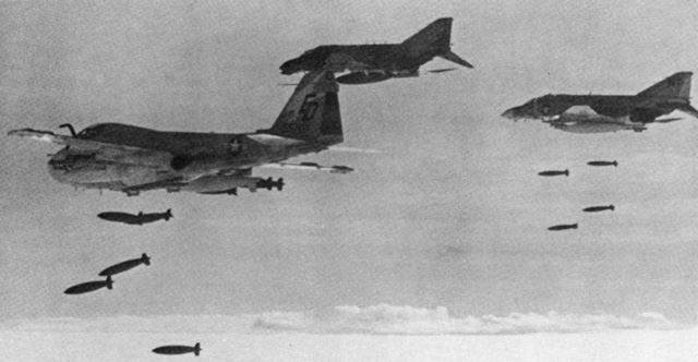 A U.S. Marine Corps and U.S. Air Force conduct a LORAN-assisted bombing in Cambodia, circa 1973. As Nixon's National Security Advisor, Henry Kissinger oversaw the needless prolongation of the Vietnam War, including the secret bombing of Cambodia that led to the Khmer Rouge holocaust.