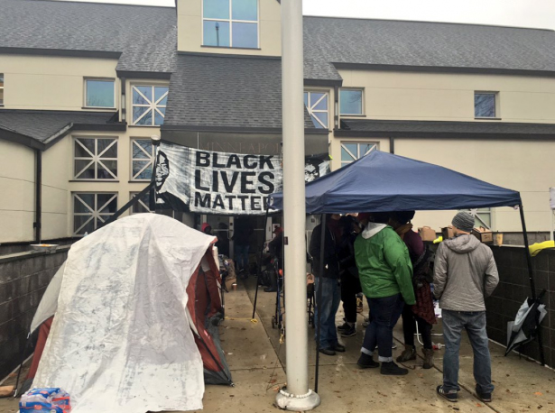 Activists set up tents outside the Fourth Precinct. (Twitter / @webster)