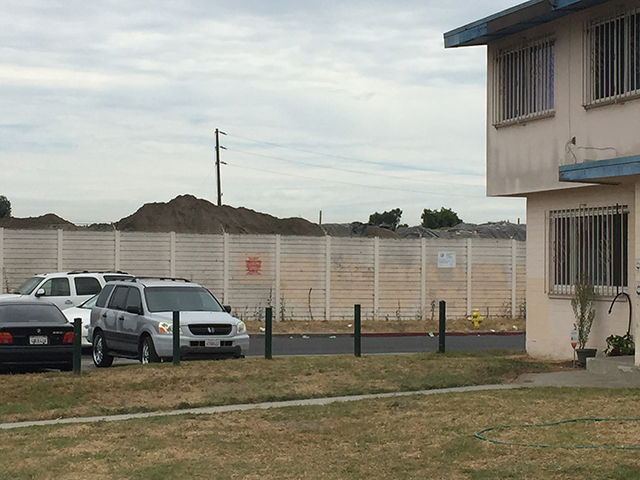 As much as 33,600 cubic yards of contaminated soil is being removed from a cleanup site at Jordan Downs in Watts, Los Angeles. Community advocates say the cleanup doesn’t meet health and safety standards. (Photo: Legal Aid Foundation)