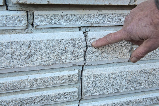 One of many cracks on Mark Crimson’s house. (Photo: Julie Dermansky)