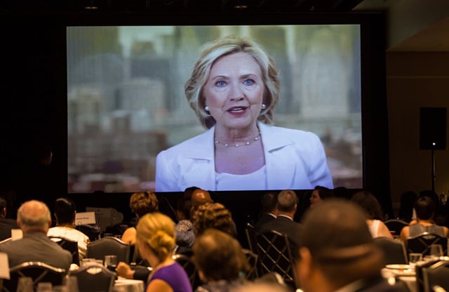 Hillary Clinton’s video message plays during a Democratic fundraiser in New Orleans on July 1, 2015. 2015 (Photo: Julie Dermansky)