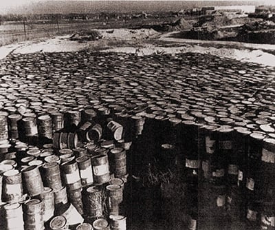 Archival image of rusting barrels of radioactive waste at the dump site near the Lambert-St. Louis International Airport. (Photo: US Department of Energy)