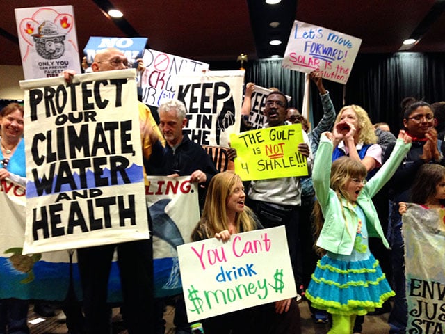 Protesters disrupt a federal auction of offshore drilling leases at the Superdome in New Orleans on Wednesday. (Photo: Mike Ludwig)