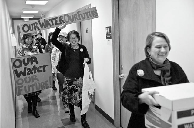 Aurora del Val, Pamela Larsen, Molly Kissinger and Local Water Alliance volunteers deliver signatures needed for 14-55 to be put on the ballot in May. (Photo: John Chao)