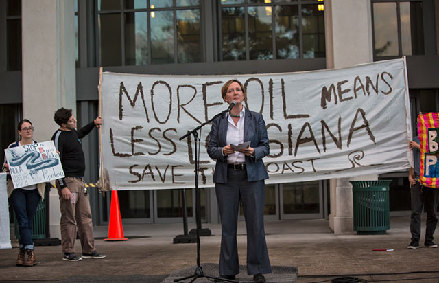 Anne Rolfes of the Louisiana Bucket Brigade leads an anti-pipeline rally before a January 12 permit hearing about the Bayou Bridge pipeline, which would cross the Atchafalaya Basin, a national heritage area and America's largest natural swamp. (Photo: Julie Dermansky)