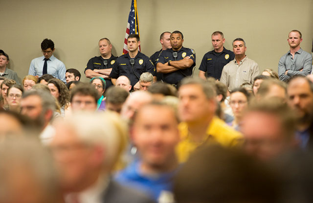 Law enforcement officers on hand at the packed Bayou Bridge pipeline permit hearing. (Photo: Julie Dermansky)