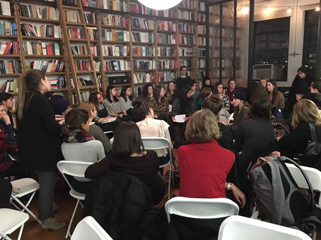 People take part in a pre-inauguration planning meeting organized by National Women's Liberation at the Verso loft in Brooklyn, New York. (Photo: Erin Mahoney)