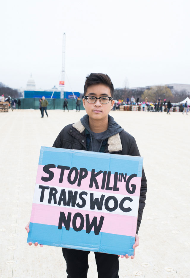 Thy, non-binary, marched for the Trans community, and is worried what a Trump administration would bring. (Photo: Zach Roberts) 