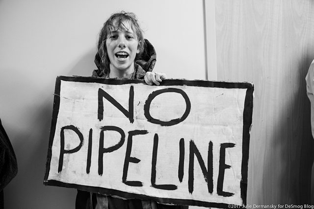 Opponents of the Bayou Bridge pipeline outside of Frank Cole's office with the Louisiana Department of Natural Resources. (Photo: Julie Dermansky)