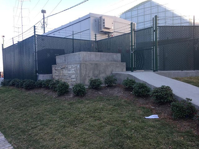 A concrete platform is all that remains at the former site of a  monument dedicated to the Crescent City White League, a group of Confederate  veterans and white supremacists who fought a Reconstruction-era battle against  integrated police forces in 1874. (Photo: Mike Ludwig)