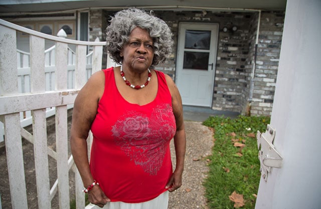 Geraldine Watkins, in front of her home in LaPlace, less than a half mile from Denka’s plant. (Photo: Julie Dermansky)