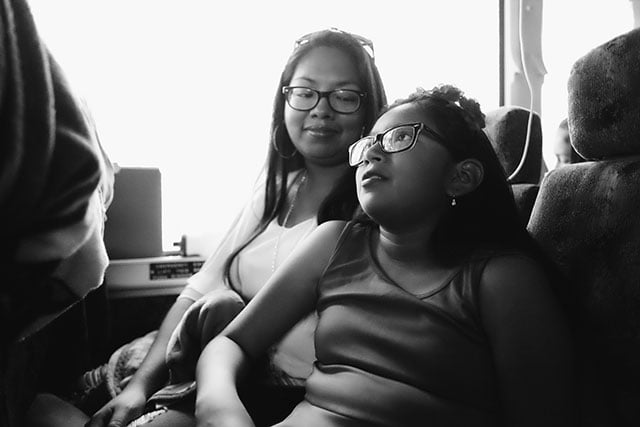 Atlanta, Georgia, April 11, 2017: Jasmine rides the We Belong Together Kids Caravan bus with her mother, who currently has DACA but fears losing it. Jasmine’s mother tells me her daughter is her hero. Jasmine has joined this caravan in part to fight for her mother and her undocumented father. (Photo: Steve Pavey)