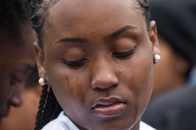 Rayshunda Guiden, a cousin of Charleena Lyles, cries while listening to another family member speak during a protest and rally in honor of Lyles on June 20, 2017 in Seattle, Washington. Officers from the Seattle Police Department shot and killed Lyles, a pregnant mother of four, on June 18. (Photo: David Ryder / Getty Images)