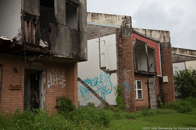 Blighted structures in Press Park, a housing project in the Ninth Ward which was abandoned after Hurricane Katrina hit New Orleans in 2005. (Photo: Julie Dermansky)