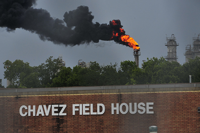  A flare most likely coming from Texas Petrochemical, now called TCP Group, behind a school in East Houston. (Photo: Bryan Parras)