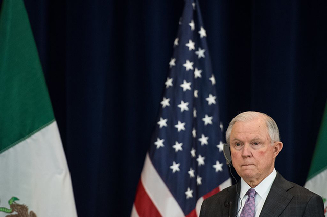 US Attorney General Jeff Sessions looks on during a press conference after the Strategic Dialogue on Disrupting Transnational Criminal Organizations with Mexican officials at the State Department in Washington, DC, on December 14, 2017. (Photo: NICHOLAS KAMM / AFP / Getty Images)