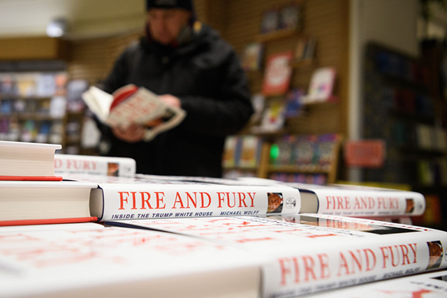 Customers purchase copies of one of the first UK consignments of Michael Wolff's book on Trump's Presidency 'Fire and Fury', at Waterstones, Piccadilly on January 9, 2018, in London, England. The book is already a bestseller with over a million orders in the US alone. (Photo by Leon Neal/Getty Images)