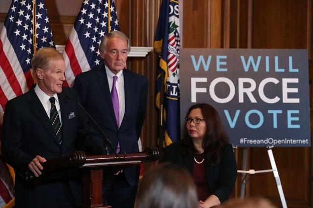 Sen. Bill Nelson (D-FL) (L) is flanked by Ed Markey (D-MA) and Tammy Duckworth (D-IL) while speaking about a Congressional Review Act resolution that would undo action by the FCC and restore the 2015 net neutrality rules, on Capitol Hill January 9, 2018 in Washington, DC. (Photo: Mark Wilson / Getty Images)