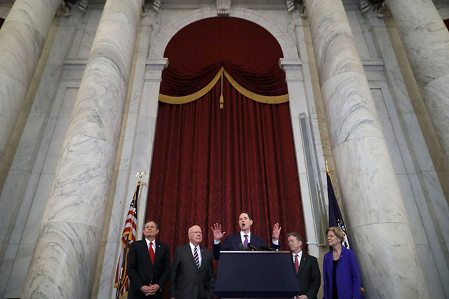 (Left to right) Sen. Steve Daines, Sen. Patrick Leahy, Sen. Ron Wyden, Sen. Rand Paul and Sen. Elizabeth Warren hold a news conference about their proposed reforms to the Foreign Intelligence Surveillance Act in the Russell Senate Office Building on Capitol Hill January 16, 2018 in Washington, DC. The senators are part of a bipartisan group that supports legislation they say would protect Americans from foreign threats while preserving their privacy. (Photo by Chip Somodevilla/Getty Images)