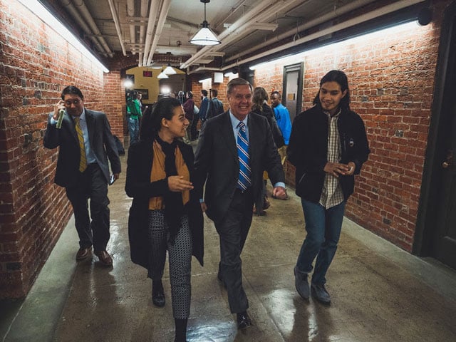 Vote4Dream activists talk to Sen. Lindsey Graham. (Photo: Diego Lozano, Creative Director at Aliento)