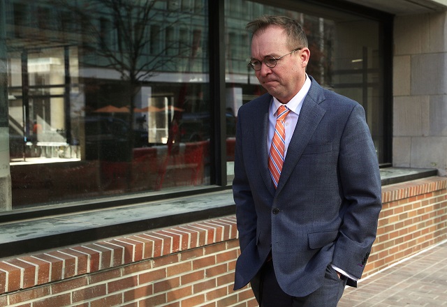 White House Budget Director Mick Mulvaney, President Donald Trump's pick for acting director of the Consumer Financial Protection Bureau, walks back to the White House from the CFPB building after he showed up for his first day of work on November 27, 2017 in Washington, DC. (Photo: Alex Wong / Getty Images)