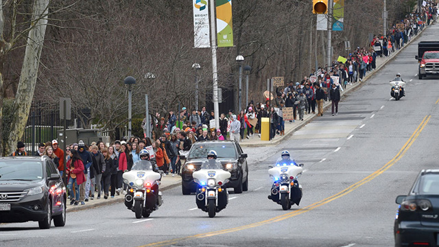 Students from the Friends School make their way along North Charles Street to meet other students from various schools on their way to City Hall for a #gunsdowngradesup school walkout on Tuesday, March 6, 2018, to protest gun violence in schools and the city. (Photo: Lloyd Fox / Baltimore Sun / TNS via Getty Images)