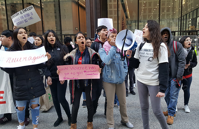 Students rally in Daley Plaza after staging a speak out and die-in at City Hall. The students then marched to Chicago Public School Headquarters. (Photo: Kelly Hayes)