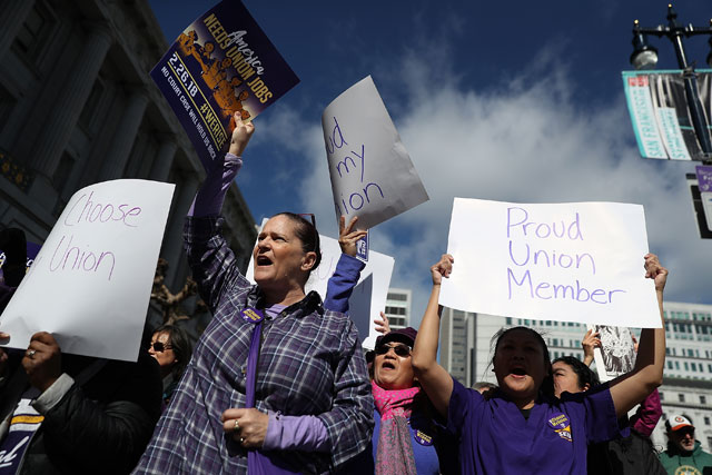 Union members hold signs during a rally outside of San Francisco City Hall on February 26, 2018 in San Francisco, California. Hundreds of union members held a rally outside of San Francisco City Hall as the US Supreme Court begins to hear oral arguments in the Janus V. AFSCME case. (Photo: Justin Sullivan / Getty Images)
