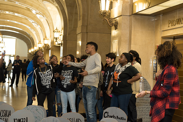 Students lift each other's spirits and amplify their message with speak-outs and performances during their daylong protest at Chicago's City Hall on Wednesday. (Photo: Sarah-Ji)