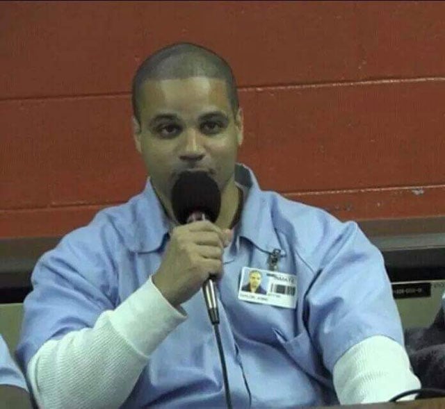 Jobie Taylor (left) speaking on social justice issues in 2013 while incarcerated at Danville Correctional Center in Illinois. (Photo: Courtesy of Jobie Taylor)