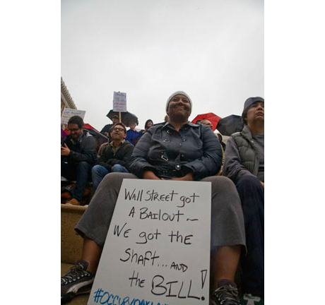 Hundreds of people met in Frank Ogawa Plaza in front of Oakland City Hall to join the nationwide protests started in New York City with Occupy Wall Street.