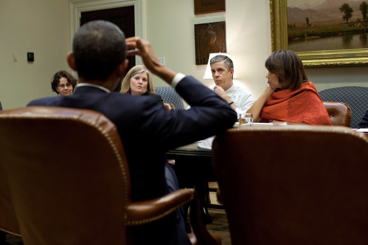 President Barack Obama meets with Education Secretary Arne Duncan and staff in the Roosevelt Room of the White House, Sept. 15, 2011.