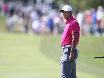 Tiger Woods watches his putt during the third round of the BMW Championship at Conway Farms Golf Club, Lake Forest, Illinois, Septermber 15, 2013.
