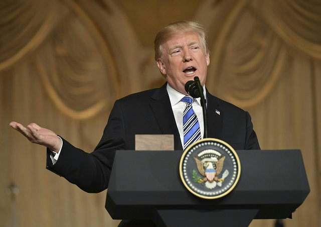 President Donald Trump speaks during a joint presser with Japan's Prime Minister Shinzo Abe at Trump's Mar-a-Lago estate in Palm Beach, Florida, on April 18, 2018.