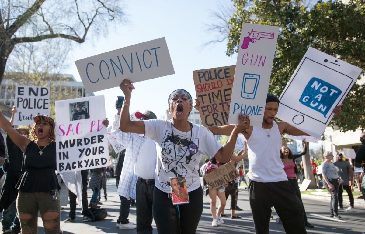 Black Lives Matter protesters march through the streets in response to the police shooting of Stephon Clark in Sacramento, California on March 28, 2018.