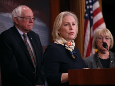 Sen. Kirsten Gillibrand speaks as Sen. Bernie Sanders and Sen. Patty Murry look on during a news conference at the US Capitol on March 14, 2017, in Washington, DC.