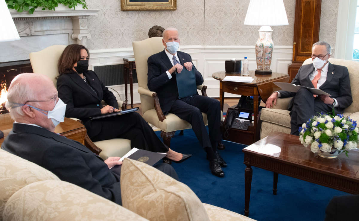 President Biden hosts a meeting alongside Vice President Kamala Harris with Senate Democrats, including Senate Majority Leader Chuck Schumer (R) and Senator Patrick Leahy (L), in the Oval Office of the White House in Washington, D.C., February 3, 2021.