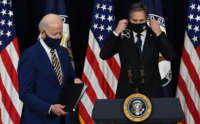 President Joe Biden, with Secretary of State Antony Blinken, arrives to speak to the staff of the State Department during his first visit in Washington, D.C., February 4, 2021.