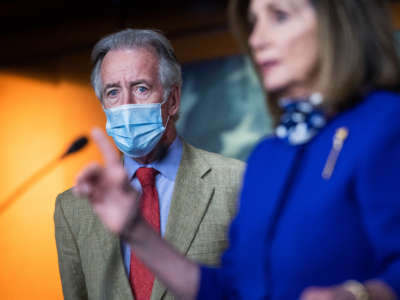 Rep. Richard Neal stands by as Speaker of the House Nancy Pelosi speaks at a news conference in the Capitol Visitor Center on July 24, 2020.