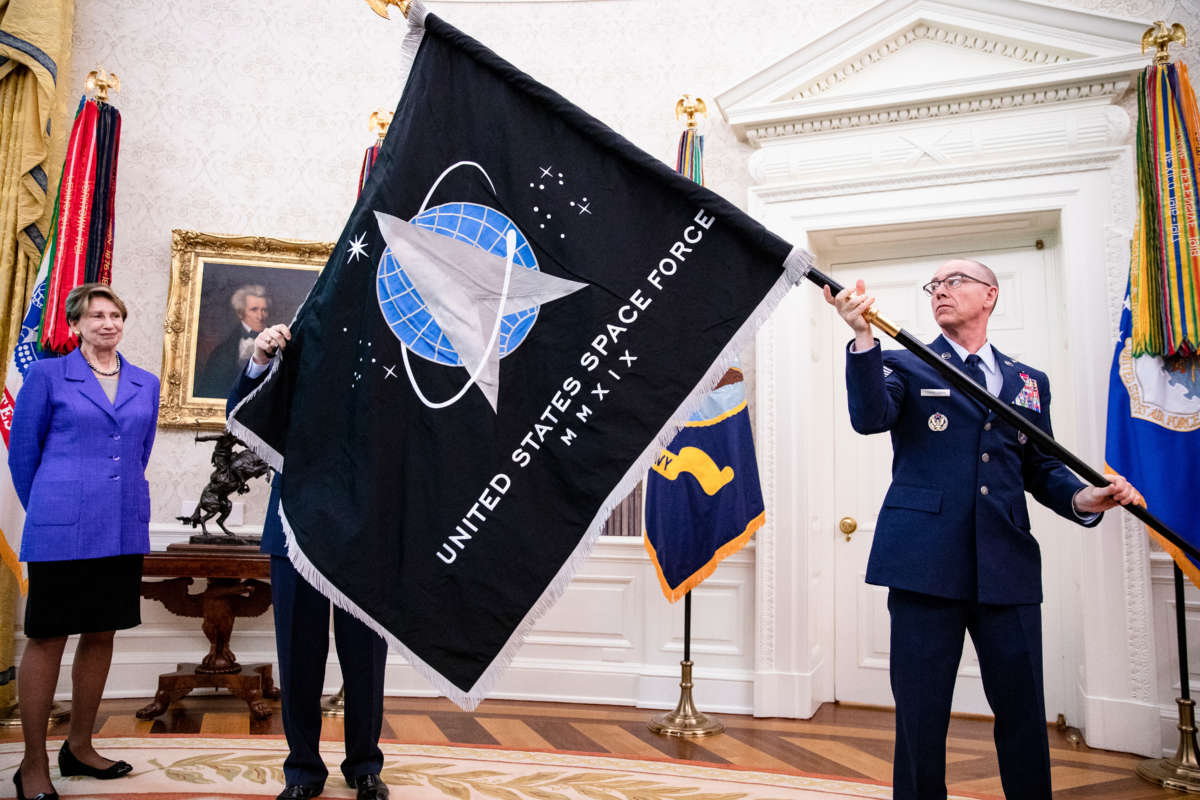 The official flag of the United States Space Force is presented in the Oval Office of the White House in Washington, D.C. on May 15, 2020.