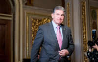 Sen. Joe Manchin walks through the Senate Reception Room to the Senate chamber on January 27, 2020.