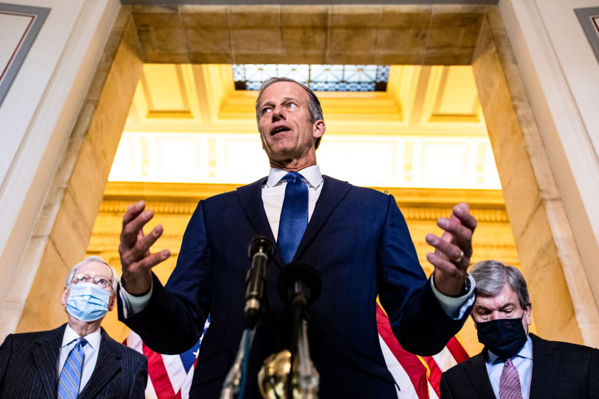Senate Minority Whip John Thune is flanked by (L-R) Senate Minority Leader Mitch McConnell and Sen. Roy Blunt as he talks during a press conference on Capitol Hill on March 2, 2021, in Washington, D.C.