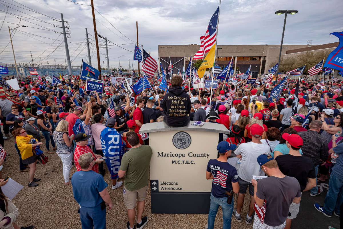 Trump supporters protest in front of the Maricopa County Election Department while votes are being counted in Phoenix, Arizona, on November 6, 2020.
