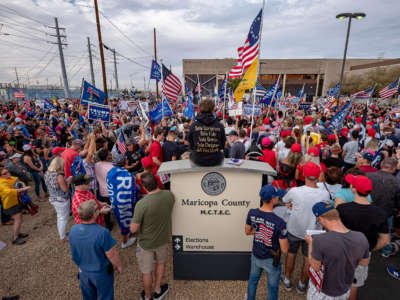 Trump supporters protest in front of the Maricopa County Election Department while votes are being counted in Phoenix, Arizona, on November 6, 2020.