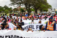 Youth activists participate in the Global Climate Strike March on October 2, 2020, in Durban, South Africa.